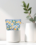 quilted pouch with lemon and blue tile pattern on white background