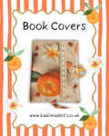 Decorative notebook with floral and fruit design on a white background