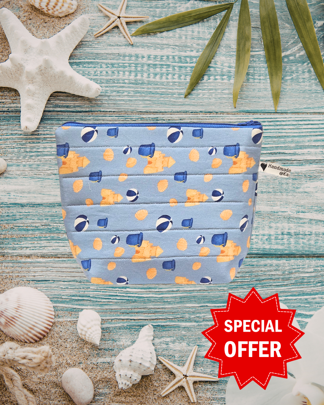 Fabric pouch with beach pattern on a wooden surface with shells and starfish, featuring a 'Special Offer' label.