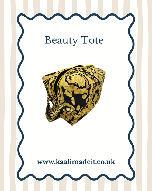 A beauty tote bag with a black and gold baroque pattern, presented on a white card with a wavy blue border. The card features the text 'Beauty Tote' and the website 'www.
