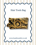 A black and gold patterned hair tools bag shown on a white card with a blue scalloped border, with the text 'Hair Tools Bag' and the website 'www.kaalimadeit.