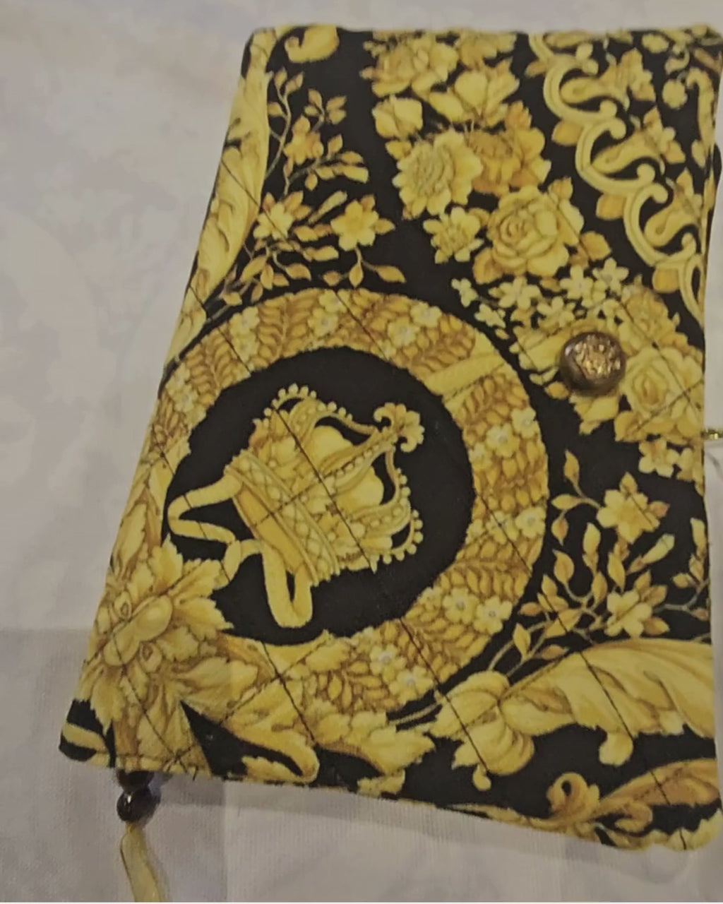 baroque design book cover with gold button 