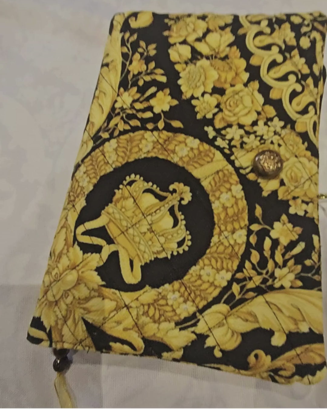 baroque design book cover with gold button 