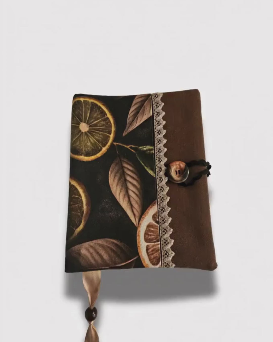 brown lemon print book cover on white and stripe background video openig and closing 