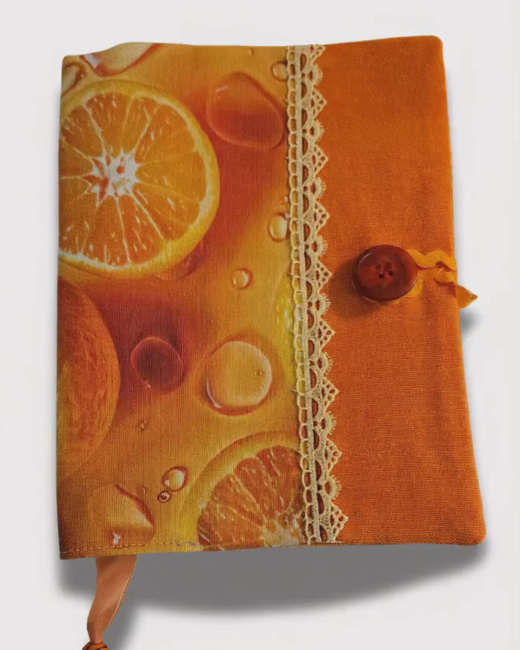 citrus print book cover opening and closing to show a notebook