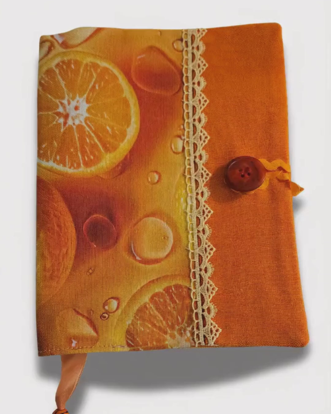 citrus print book cover opening and closing to show a notebook
